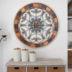 Wood Scroll Arabesque Wall Decor With Metal Fleur De Lis Relief Brown - Olivia & May 24 Wood Scroll Arabesque Wall Decor With Metal Fleur De Lis Relief Brown - Olivia & May -Adesso Store GUEST a6438883 85cd 42b1 8665 e9ec92651124